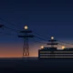 Illustration of high-voltage transmission towers at dusk carrying power lines toward a lit data-center campus.